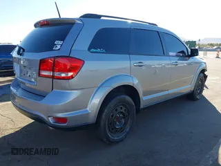 2019 Dodge Journey SE with VIN 3C4PDCBG0KT701223, listed as a IAAI auction lot 41286446 with 71,572 mi miles and . Bid and sale history available at DreamBid. Image 4.