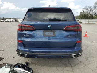 2023 BMW X5 xDrive45e with VIN 5UXTA6C06P9P92118, listed as a Copart auction lot 51798505 with Not provided miles and Salvage title. Bid and sale history available at DreamBid. Image 6.
