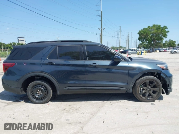 2023 Ford Explorer ST-Line with VIN 1FMSK7KH7PGB53387, listed as a IAAI auction lot 42279577 with 24,905 mi miles and . Bid and sale history available at DreamBid. Image 14.