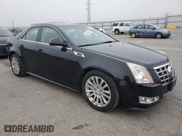 2013 Cadillac CTS Premium with VIN 1G6DP5E37D0143159, listed as a Copart auction lot 85570024 with 102,743 mi miles and Salvage Title. Bid and sale history available at DreamBid. Image 4.