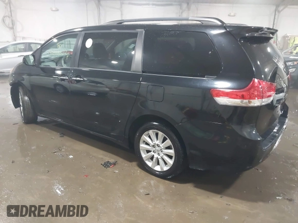 2014 Toyota Sienna Ltd with VIN 5TDDK3DC7ES072058, listed as a IAAI auction lot 41548332 with 153,742 mi miles. Bid and sale history available at carsss.com. Image 3.