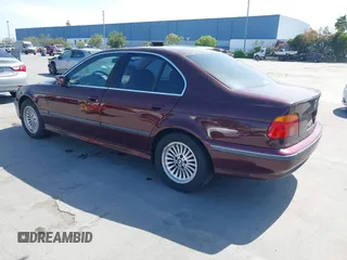 1998 BMW 5 Series 540iA with VIN WBADE6325WBW59821, listed as a IAAI auction lot 42063032 with 199,693 mi miles. Bid and sale history available at carsss.com. Image 3.
