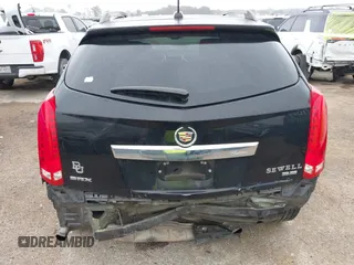 2016 Cadillac SRX Luxury Collection z VIN 3GYFNBE32GS577023, wystawiony jako IAAI lot #42374130 z przebiegiem 132 671 mil mil oraz . Historia ofert i sprzedaży dostępna na DreamBid. Obrazek 16.
