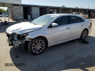 2013 Toyota Avalon XLE with VIN 4T1BK1EB5DU040765, listed as a Copart auction lot 57907955 with 147,231 mi miles and Salvage title. Bid and sale history available at DreamBid. Image 1.