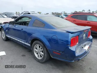 2009 Ford Mustang with VIN 1ZVHT80N395122241, listed as a IAAI auction lot 42121401 with 166,216 mi miles and . Bid and sale history available at carsss.com. Image 3.