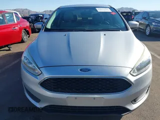 2018 Ford Focus SE z VIN 1FADP3F27JL204873, wystawiony jako IAAI lot #41657504 z przebiegiem 99 224 mil mil oraz . Historia ofert i sprzedaży dostępna na DreamBid. Obrazek 12.