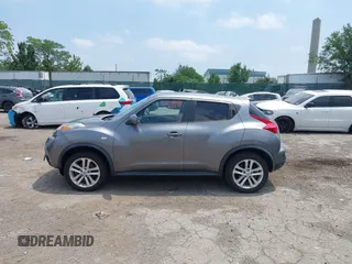 2014 Nissan Juke SL with VIN JN8AF5MV3ET359021, listed as a IAAI auction lot 42602201 with 99,332 mi miles and . Bid and sale history available at DreamBid. Image 14.