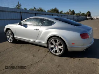 2013 Bentley Continental GT with VIN SCBFT7ZA1DC085265, listed as a Copart auction lot 76097134 with 14,756 mi miles and Salvage Title. Bid and sale history available at DreamBid. Image 2.