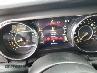 2023 Jeep Wrangler Sport with VIN 1C4HJXDG8PW643414, listed as a Copart auction lot 87768255 with 31,894 mi miles and Salvage Title. Bid and sale history available at DreamBid. Image 9.