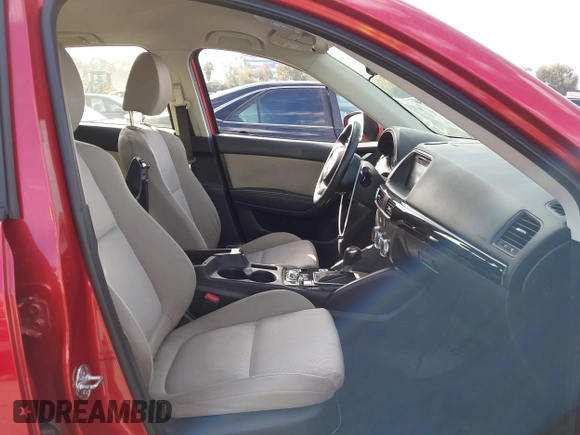2016 Mazda CX-5 Sport with VIN JM3KE2BY4G0701442, listed as a IAAI auction lot 41682335 with 125,624 mi miles. Bid and sale history available at carsss.com. Image 5.