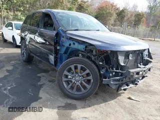 2018 Jeep Grand Cherokee High Altitude z VIN 1C4RJECG0JC437877, wystawiony jako IAAI lot #41824404 z przebiegiem 82 726 mil mil oraz . Historia ofert i sprzedaży dostępna na DreamBid. Obrazek 1.