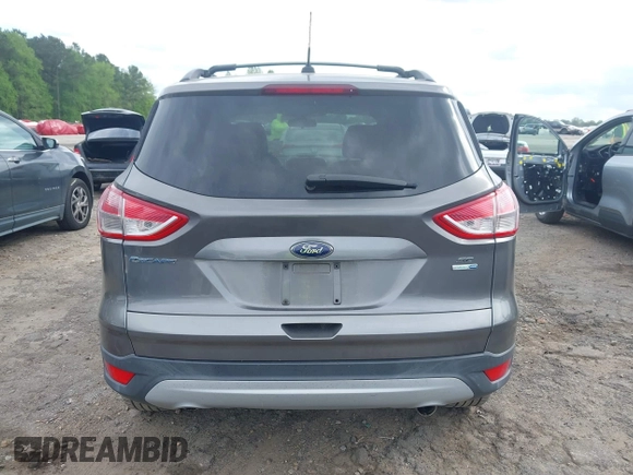 2013 Ford Escape SE with VIN 1FMCU9GX4DUC98328, listed as a IAAI auction lot 41956249 with 114,195 mi miles and . Bid and sale history available at DreamBid. Image 15.