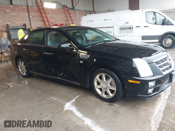 2011 Cadillac STS RWD w/1SB with VIN 1G6DW6ED1B0121186, listed as a IAAI auction lot 42094324 with 101,886 mi miles. Bid and sale history available at carsss.com. Image 1.