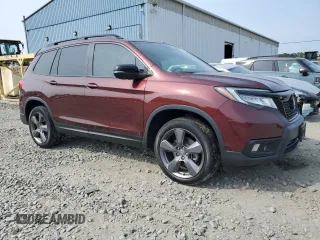 2019 Honda Passport Touring with VIN 5FNYF8H9XKB026631, listed as a Copart auction lot 61037545 with 54,041 mi miles and Salvage title. Bid and sale history available at DreamBid. Image 4.