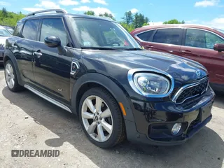 2017 MINI Countryman Cooper S z VIN WMZYT5C39H3D79798, wystawiony jako IAAI lot #42274782 z przebiegiem 96 669 mil mil oraz . Historia ofert i sprzedaży dostępna na DreamBid. Obrazek 1.