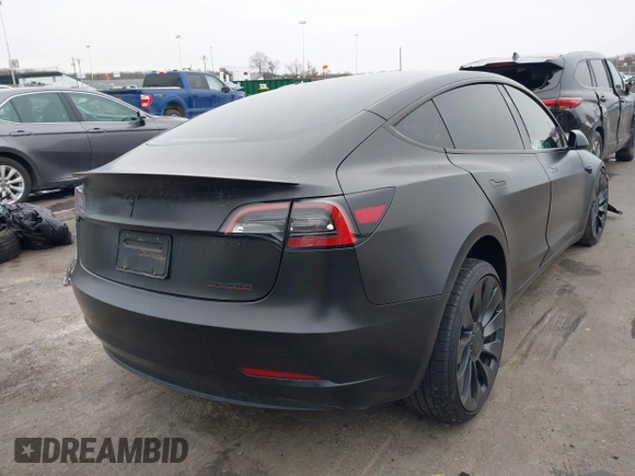 2023 Tesla Model 3 Performance with VIN 5YJ3E1ECXPF595295, listed as a IAAI auction lot 41501111 with 1 mi miles. Bid and sale history available at carsss.com. Image 4.