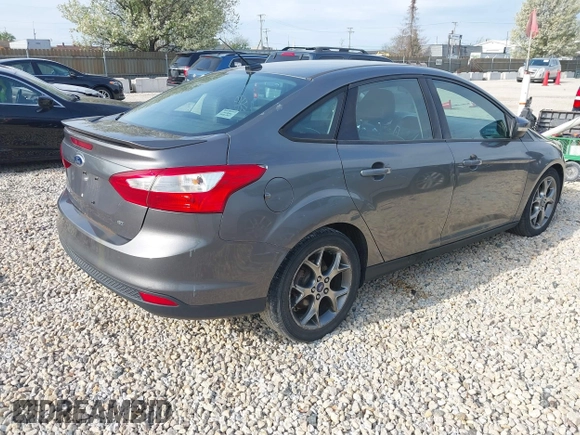 2013 Ford Focus SE with VIN 1FADP3F22DL117712, listed as a IAAI auction lot 42131439 with 124,327 mi miles. Bid and sale history available at carsss.com. Image 4.