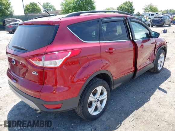 2016 Ford Escape SE z VIN 1FMCU9GX1GUC04815, wystawiony jako IAAI lot #42235499 z przebiegiem 84 713 mil mil oraz . Historia ofert i sprzedaży dostępna na DreamBid. Obrazek 4.