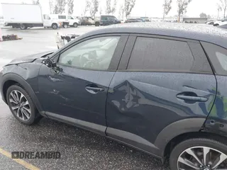 2019 Mazda CX-3 Touring with VIN JM1DKDC79K0424436, listed as a IAAI auction lot 41579280 with 76,989 mi miles. Bid and sale history available at carsss.com. Image 18.
