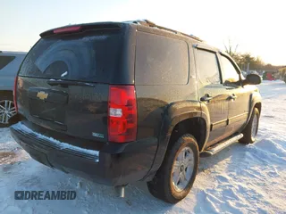 2012 Chevrolet Tahoe LT with VIN 1GNSKBE09CR295291, listed as a IAAI auction lot 41261810 with 133,400 mi miles and . Bid and sale history available at DreamBid. Image 4.