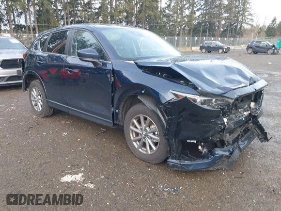 2024 Mazda CX-5 2.5 S Carbon Edition with VIN JM3KFBCLXR0512670, listed as a IAAI auction lot 41462557 with 5,795 mi miles. Bid and sale history available at carsss.com. Image 1.