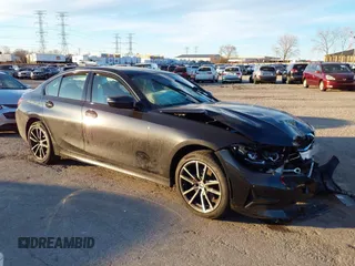 2022 BMW 3 Series 330i xDrive with VIN 3MW5R7J03N8C37885, listed as a IAAI auction lot 41018959 with 13,491 mi miles. Bid and sale history available at carsss.com. Image 1.