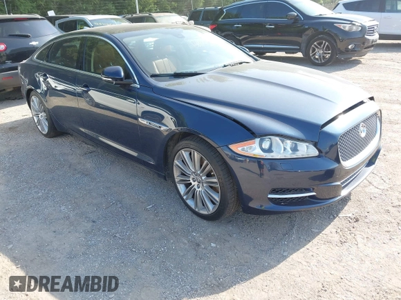 2013 Jaguar XJ Supercharged with VIN SAJWA2GE8DMV43164, listed as a IAAI auction lot 42549807 with 59,744 mi miles and . Bid and sale history available at DreamBid. Image 1.