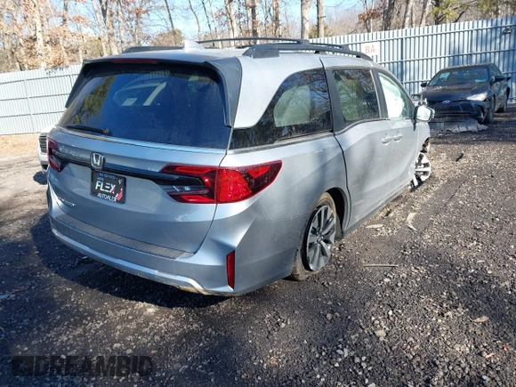 2025 Honda Odyssey EX-L with VIN 5FNRL6H64SB016104, listed as a IAAI auction lot 41456550 with 61 mi miles and . Bid and sale history available at DreamBid. Image 4.