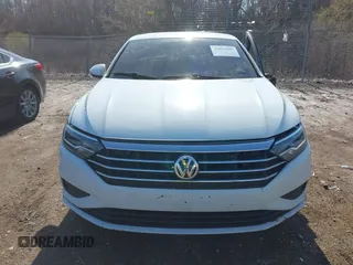 2020 Volkswagen Jetta S z VIN 3VWCB7BUXLM042951, wystawiony jako IAAI lot #42012007 z przebiegiem 61 806 mil mil oraz . Historia ofert i sprzedaży dostępna na DreamBid. Obrazek 13.