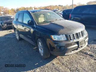 2011 Jeep Compass with VIN 1J4NF1FB6BD134990, listed as a IAAI auction lot 40602424 with 178,313 mi miles. Bid and sale history available at carsss.com. Image 1.