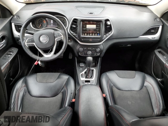 2016 Jeep Cherokee Trailhawk with VIN 1C4PJMBS2GW255368, listed as a Copart auction lot 59010305 with 105,667 mi miles and Salvage title. Bid and sale history available at DreamBid. Image 8.