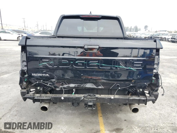 2025 Honda Ridgeline RTL with VIN 5FPYK3F52SB014785, listed as a Copart auction lot 59982875 with 2,341 mi miles and Salvage title. Bid and sale history available at DreamBid. Image 6.