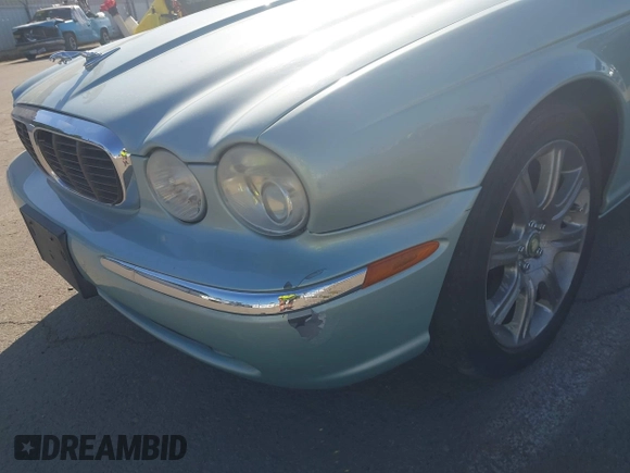 2004 Jaguar XJ 8 with VIN SAJEA71CX4SG10751, listed as a IAAI auction lot 42149348 with 89,786 mi miles and . Bid and sale history available at DreamBid. Image 12.