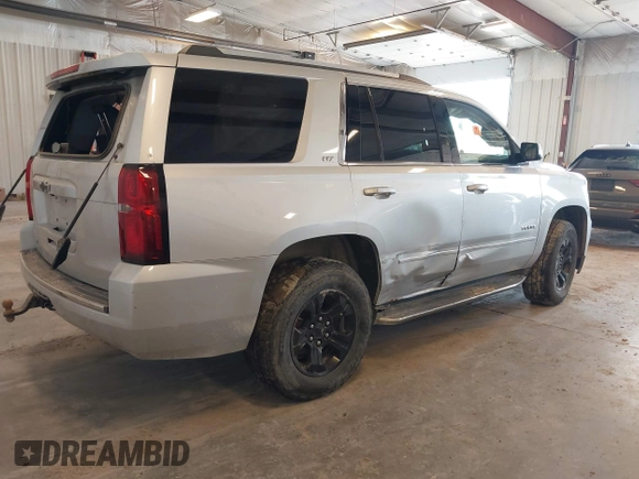 2016 Chevrolet Tahoe LTZ with VIN 1GNSKCKCXGR477284, listed as a IAAI auction lot 42221589 with Not provided miles and . Bid and sale history available at DreamBid. Image 4.