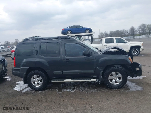 2011 Nissan Xterra Pro-4X with VIN 5N1AN0NW1BC506369, listed as a IAAI auction lot 41802083 with 133,107 mi miles. Bid and sale history available at carsss.com. Image 13.
