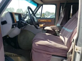 1994 Chevrolet Chevy Van z VIN 1GBEG25K5RF123489, wystawiony jako Copart lot #79491854 z przebiegiem 82 970 mil mil oraz Szkoda całkowita • Salvage title. Historia ofert i sprzedaży dostępna na DreamBid. Obrazek 7.