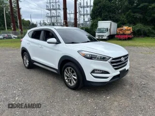 2018 Hyundai Tucson SEL z VIN KM8J33A40JU676727, wystawiony jako Copart lot #87532055 z przebiegiem 128 554 mil mil oraz Czysty tytuł • Clean title. Historia ofert i sprzedaży dostępna na DreamBid. Obrazek 1.