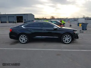 2014 Chevrolet Impala LTZ with VIN 2G1155S31E9211885, listed as a IAAI auction lot 41804249 with 149,066 mi miles. Bid and sale history available at carsss.com. Image 14.