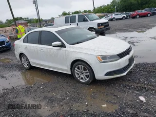 2011 Volkswagen Jetta TDI with VIN 3VWLL7AJ2BM110906, listed as a IAAI auction lot 42361314 with 152,715 mi miles and . Bid and sale history available at DreamBid. Image 1.