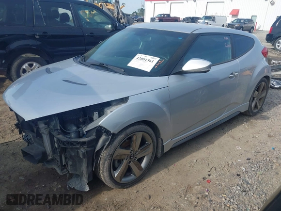 2013 Hyundai Veloster Turbo with VIN KMHTC6AE4DU157798, listed as a IAAI auction lot 42001561 with 163,370 mi miles and . Bid and sale history available at DreamBid. Image 2.