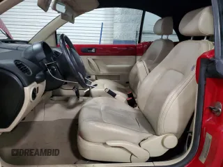 2009 Volkswagen Beetle S with VIN 3VWRG31YX9M400423, listed as a Copart auction lot 45750915 with 113,410 mi miles and Salvage title. Bid and sale history available at DreamBid. Image 7.