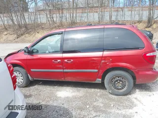 2006 Chrysler Town & Country with VIN 1A4GP45RX6B584391, listed as a IAAI auction lot 41882597 with 160,886 mi miles and . Bid and sale history available at DreamBid. Image 14.