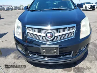 2012 Cadillac SRX Performance Collection z VIN 3GYFNBE30CS659973, wystawiony jako IAAI lot #42555119 z przebiegiem 141 842 mil mil oraz . Historia ofert i sprzedaży dostępna na DreamBid. Obrazek 12.