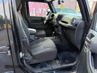 2015 Jeep Wrangler Unlimited Sport with VIN 1C4BJWDG8FL502570, listed as a Copart auction lot 65854505 with 120,541 mi miles and Clean title. Bid and sale history available at DreamBid. Image 5.