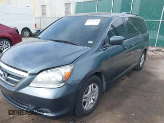 2005 Honda Odyssey EX-L with VIN 5FNRL38645B421253, listed as a IAAI auction lot 42106184 with 157,717 mi miles. Bid and sale history available at carsss.com. Image 2.