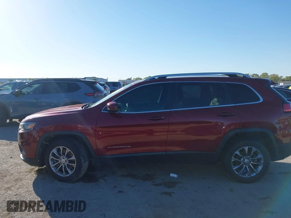 2020 Jeep Cherokee Latitude Plus with VIN 1C4PJLLB3LD624382, listed as a IAAI auction lot 40799441 with 66,588 mi miles. Bid and sale history available at carsss.com. Image 13.