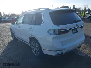2023 BMW X7 xDrive40i with VIN 5UX23EM08P9N90606, listed as a IAAI auction lot 41692128 with 34,752 mi miles. Bid and sale history available at carsss.com. Image 3.