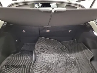 2023 Toyota Prius LE z VIN JTDACAAU6P3008616, wystawiony jako IAAI lot #42464887 z przebiegiem 24 824 mil mil oraz . Historia ofert i sprzedaży dostępna na DreamBid. Obrazek 1.