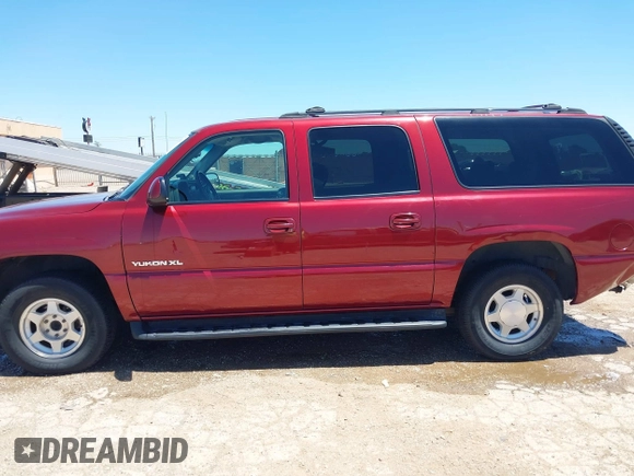 2003 GMC Yukon XL SLT z VIN 1GKEC16Z63J166423, wystawiony jako IAAI lot #42330690 z przebiegiem 190 589 mil mil oraz . Historia ofert i sprzedaży dostępna na DreamBid. Obrazek 14.