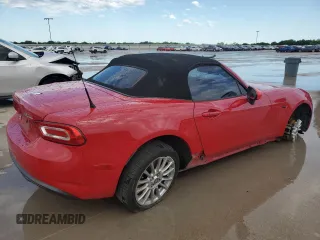 2017 FIAT 124 Spider Lusso z VIN JC1NFAEKXH0102435, wystawiony jako Copart lot #54235675 z przebiegiem 84 343 mil mil oraz Szkoda całkowita • Salvage title. Historia ofert i sprzedaży dostępna na DreamBid. Obrazek 3.